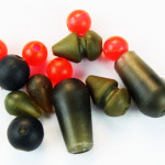 Brightly colored beads are meant to act as an attractor and camo beads hide your rig.