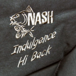 The Nash Indulgence Hi-back chair logo and stiching